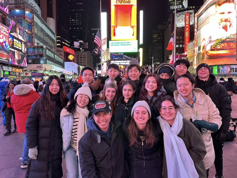 The Bishop’s MUN team, consisting of Melanie Yau(‘26), Grace Yao(‘26), Noan Cheng(‘26), Marly Berlin(‘26), Ariadne Georgiou(‘26), Sofia Hayden(‘25), Samantha Gutierrez(‘25), Emmie Kao(‘25), Selene Wang(‘25), David Lai(‘25), Nelson Qin(‘27), Nason Li(‘25), Owen Tu(‘25), Brian Kim(‘27), and TJ Gibbons(‘26), poses in Times Square for their first group photo in New York City. 
